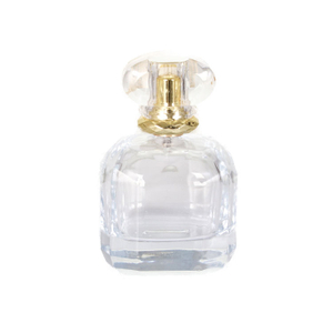 Dernière bouteille de parfum chaud avec couvercle en plastique transparent à fond épais et pulvérisateur de brume dorée