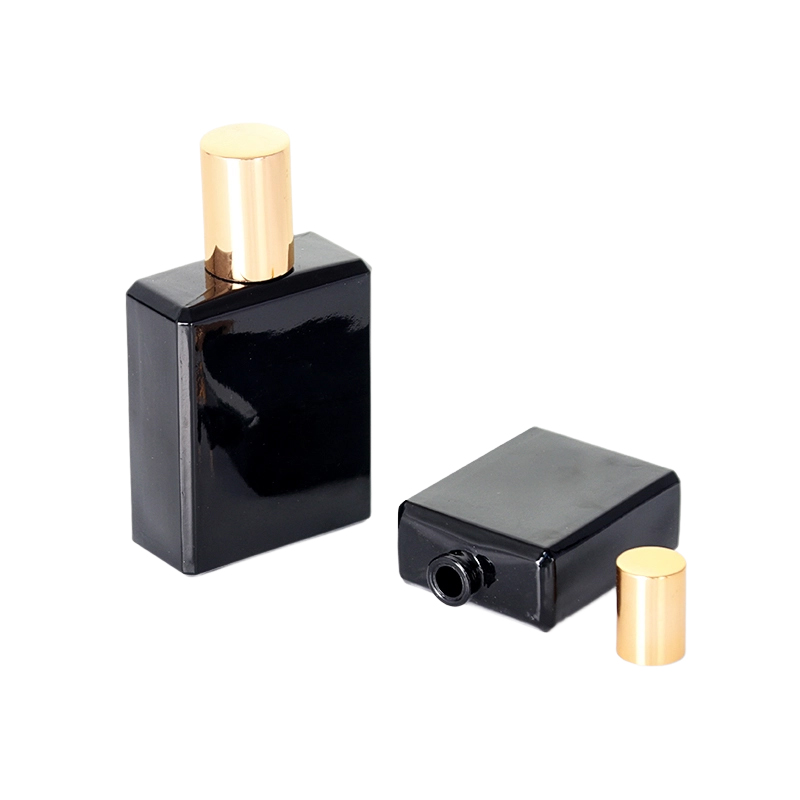 Flacon de parfum carré noir et or
