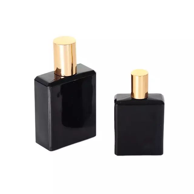 Flacon de parfum femme noir de forme rectangulaire avec bouchon doré