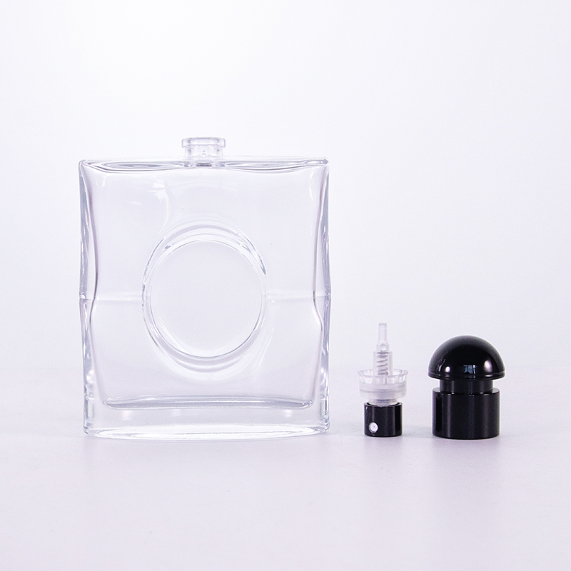 Flacon de parfum plat avec cercle sur le couvercle central en plastique noir