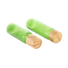 Lotion de voyage verte rechargeable avec capuchon en bambou