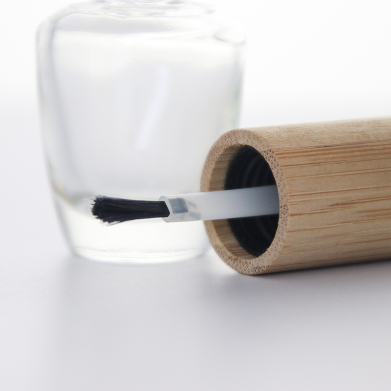 Bouteille de vernis à ongles en verre vide transparent avec couvercle en bambou