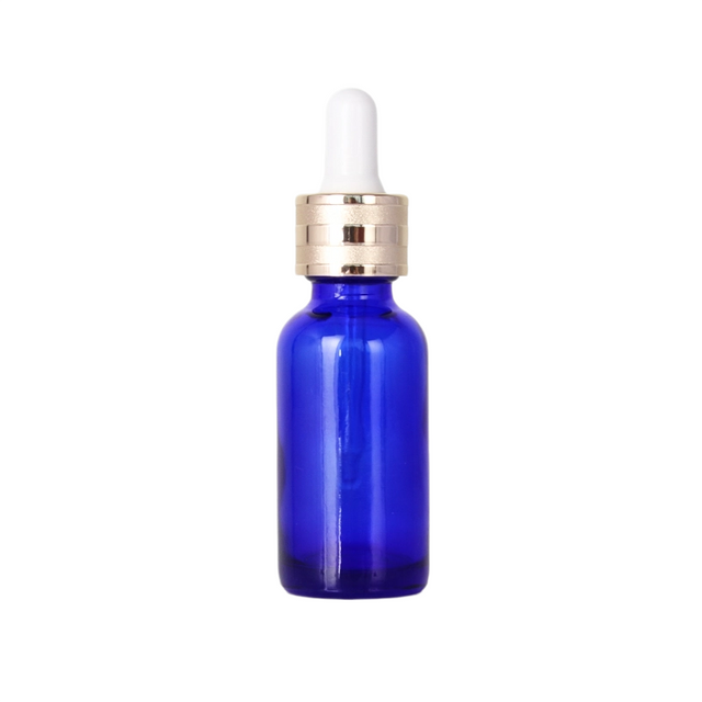 Bouteille d'huile essentielle en verre bleu de 30 ml pour un usage quotidien