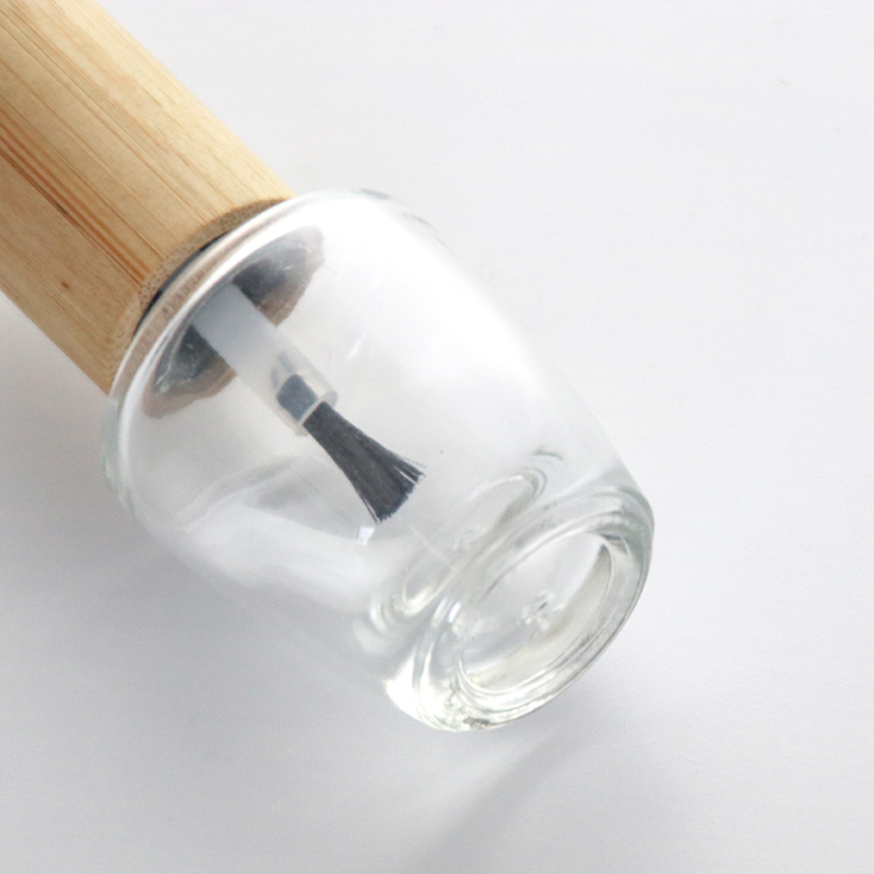 Bouteille de vernis à ongles en verre vide transparent avec couvercle en bambou