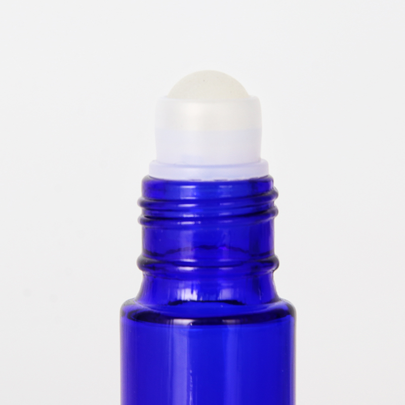 Bouteille d'huile essentielle en verre bleu de 15 ml pour les cosmétiques