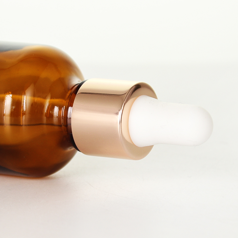 Flacon de sérum en verre Ambre Skincare avec compte-gouttes en aluminium doré pour huile essentielle