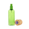 Lotion de voyage verte rechargeable avec capuchon en bambou